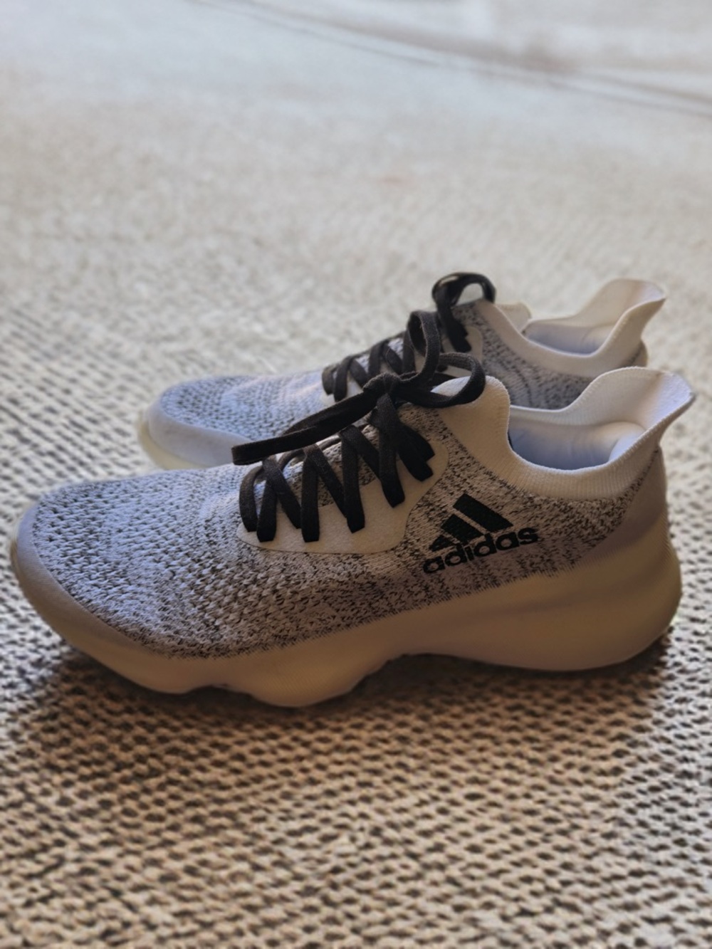 Brand new Adidas lightweight knit sneakers in Women’s Size 7.5.